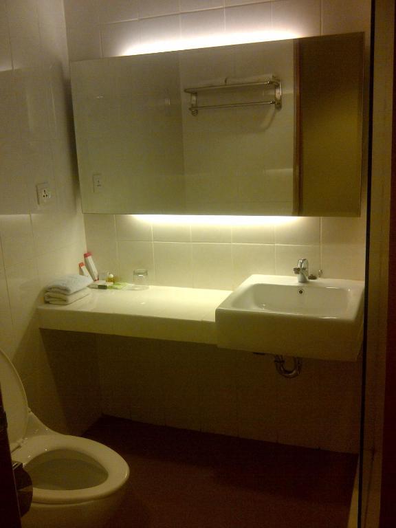 Amans Hotel Амбон Стая снимка